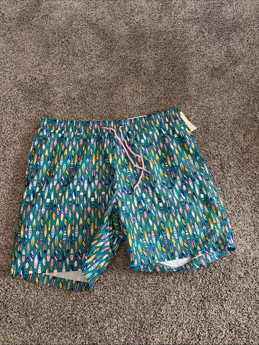 Teal Swim Trunks with Multicolor Surfboard Print